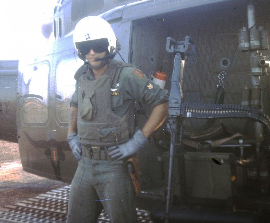 Vietnam_Huey_Door_Gunner.thumb.jpg.85df7d7aae292c6931773f72d06a2052.jpg